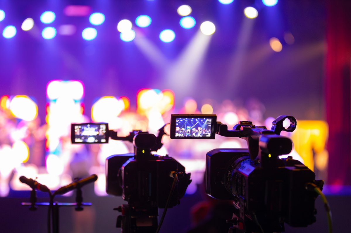 Cameras recording an event